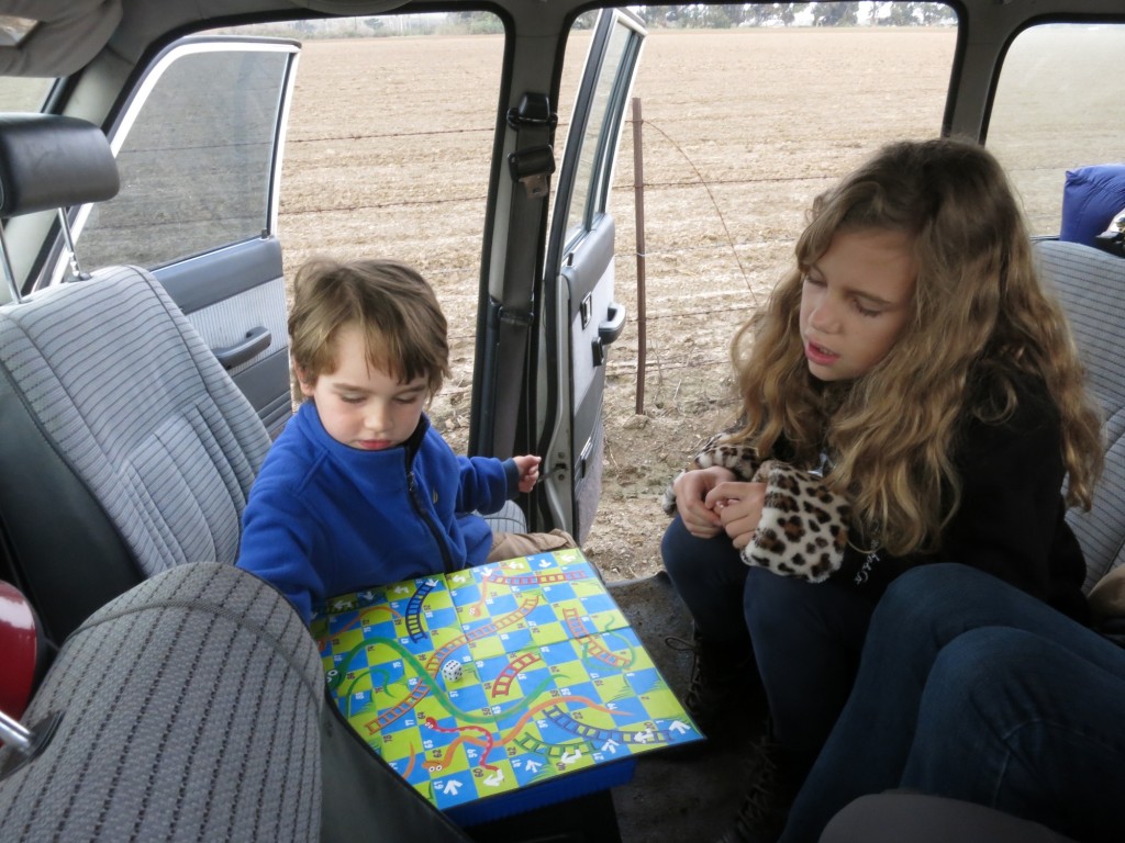 Playing Snakes and Ladders waiting for a rocket to launch