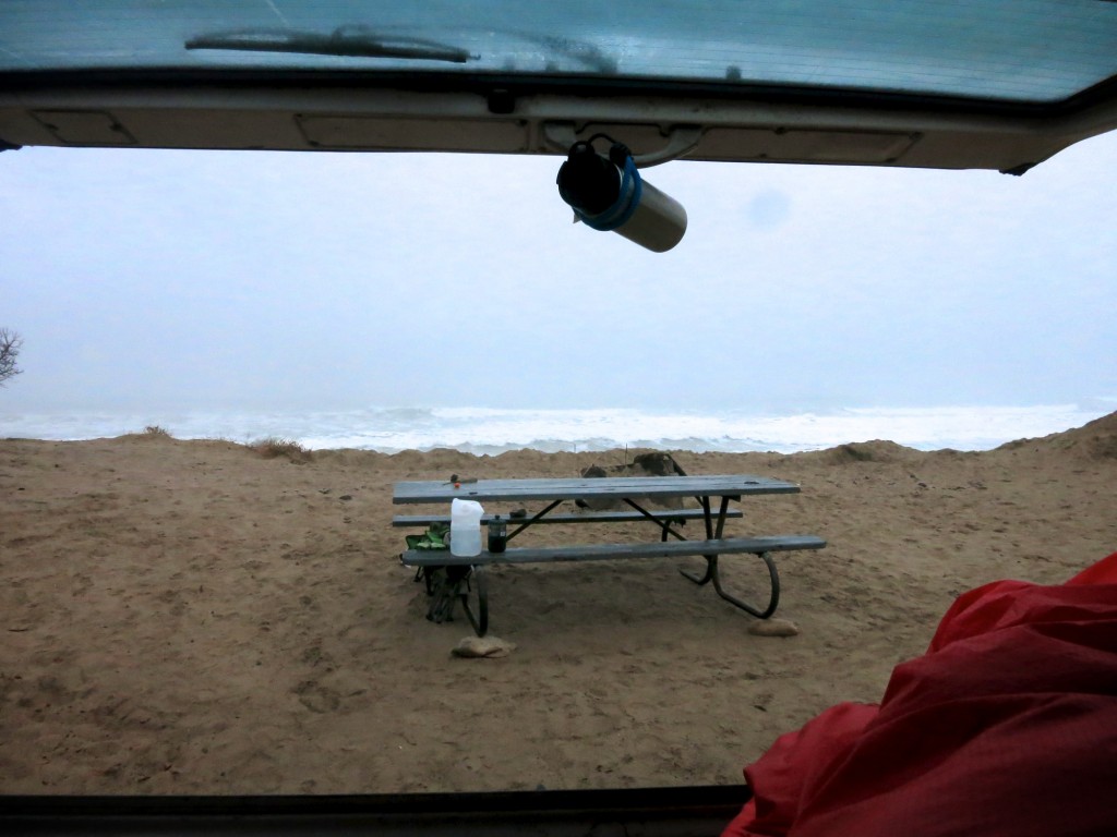 View from bed. Note coffee mug used as buffer to keep the tailgate window cracked overnight